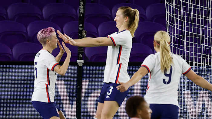 USWNT Sam Mewis celebrates with Megan Rapinoe